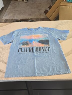 Claude Monet Graphic Tee - Light Blue with Pastel Sunset Print